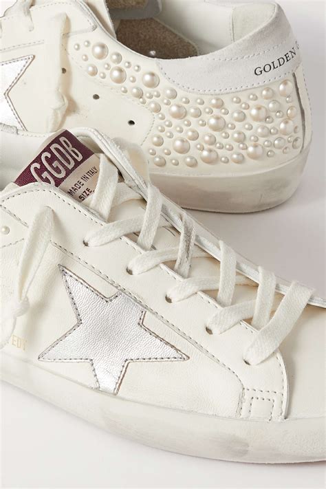 golden goose sneakers with pearls.